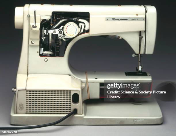 This partially sectioned semi-automatic sewing machine was made by the Husqvarna Company of Sweden, which manufactured firearms from 1689 and sewing...