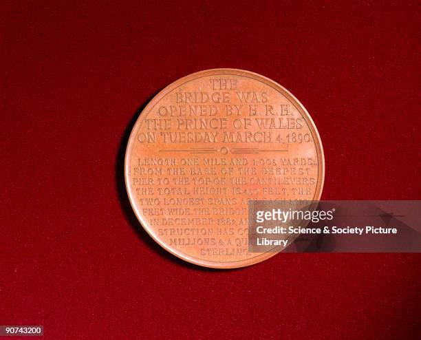Bronze medal by L C Lauer. Reverse view showing text. When it was opened in 1890, this cantilever bridge over the Forth estuary in Scotland was the...
