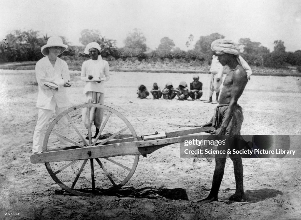 Measuring land for cultivation, Allahabad, India, 1877.