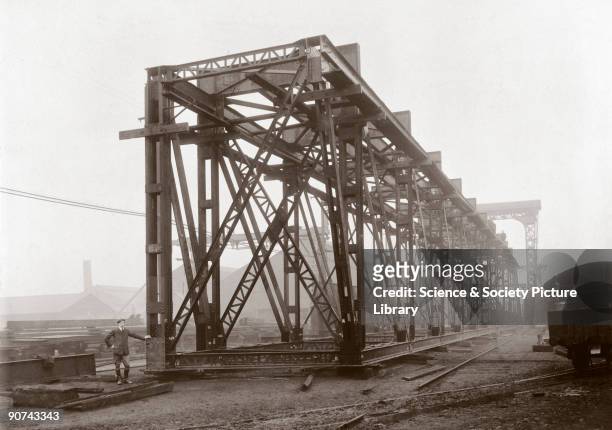 This photograph shows a section of the Guali River Bridge which was part of an extension of the Dorada Railway at Honda, northern Colombia. The...