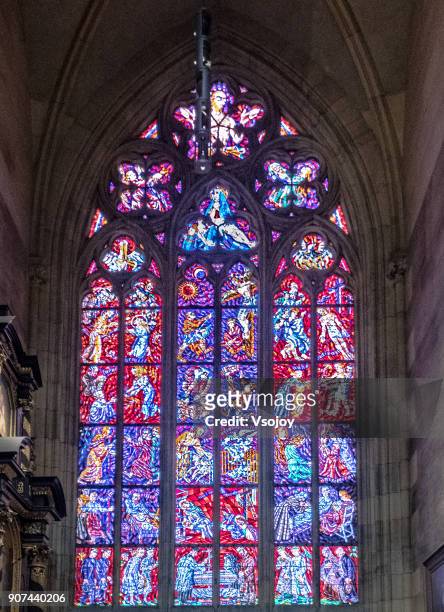 close up the coloured stained-glass windows, st. vitus cathedral, prague castle, czech republic - stained glass czech republic stock pictures, royalty-free photos & images