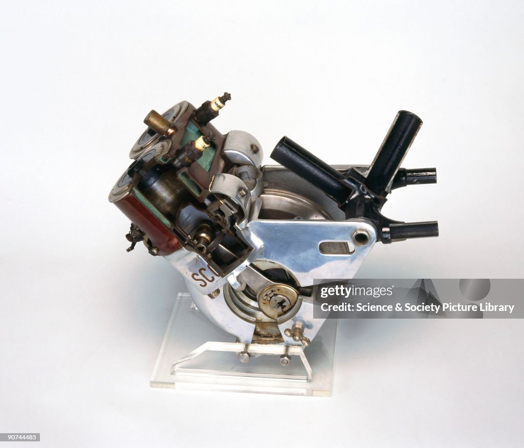Scoot Tube Engine Sectioned. This is a 3.75 hp twin two-stroke motorcycle engine based ...
