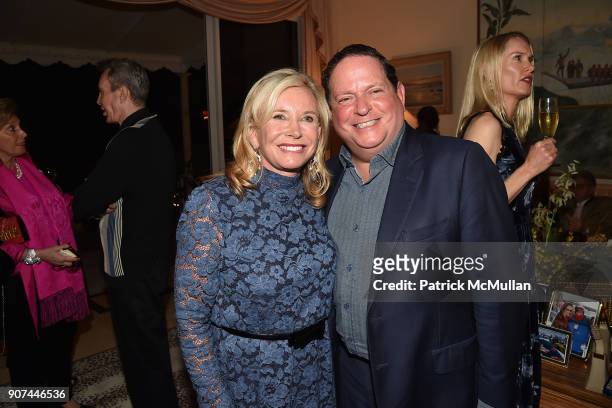 Sharon Bush and David Hochberg attend Mrs. Ava Roosevelt, philanthropist and author of The Racing Heart, hosts one hundred guests at her Palm Beach...
