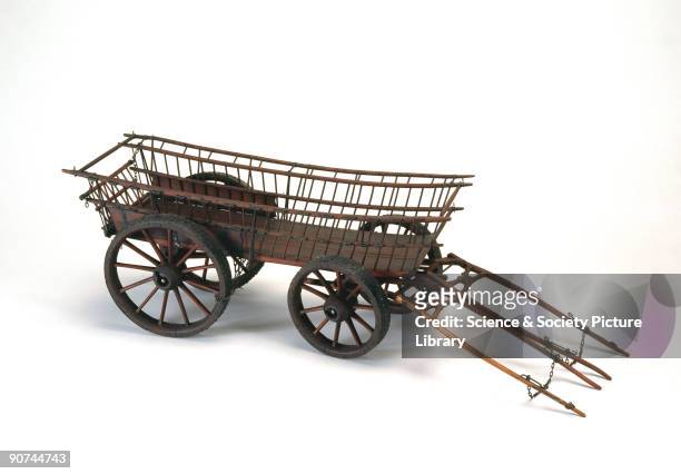 Model . An example of the kind of four-wheeled agricultural wagon in use in Surrey and neighbouring counties for carting bulky crops, such as hay or...