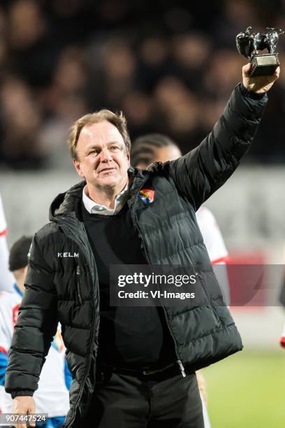 Coach Mike Snoei of Telstar gets the Bronzen Stier of Best coach of the second period in the competition during the Jupiler League match between...