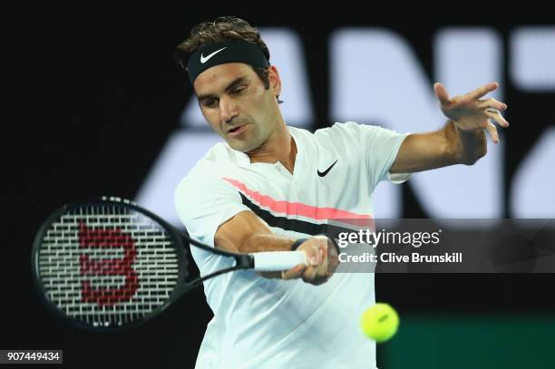 Roger Federer of Switzerland plays a forehand in his third round match against Richard Gasquet of France on day six of the 2018 Australian Open at...