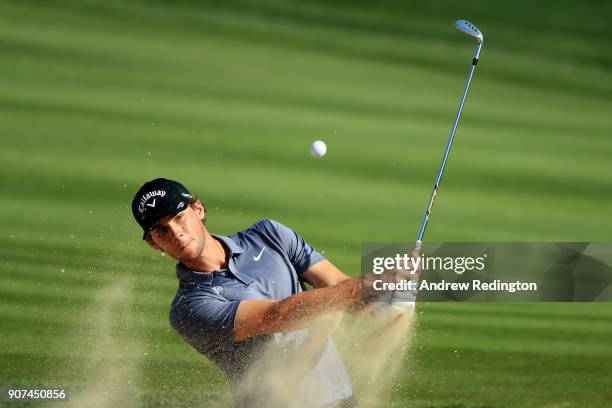 Thomas Pieters of Belgium plays his third shot from a bunker on the tenth hole during round three of the Abu Dhabi HSBC Golf Championship at Abu...