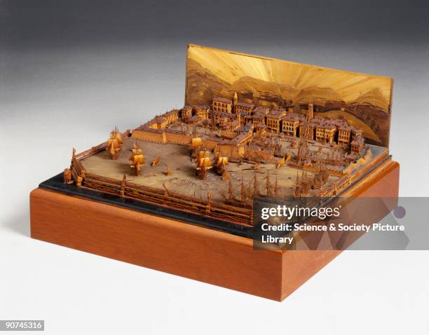 Model. The title is fretted in silhouette form in the balustrading surrounding this model, which gives a detailed and realistic view of the port and...