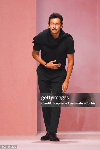 Fashion designer Haider Ackermann walks the runway during the Berluti Menswear Fall/Winter 2018-2019 show as part of Paris Fashion Week January 19,...