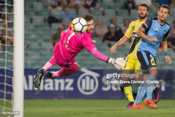 Bobo of Sydney FC heads the ball past Mariners keeper Ben Kennedy but is later called offside during the round 17 A-League match between Sydney FC...