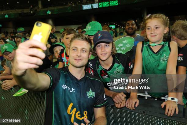 Luke Wright takes a selfie with a fan during the Big Bash League match between the Melbourne Stars and the Sydney Thunder at Melbourne Cricket Ground...