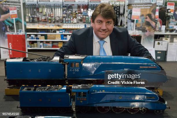 Stephen Metcalfe MP, the new 2018 Government Envoy for the Year of Engineering poses for a photograph with a model Mallard steam locomotive train at...