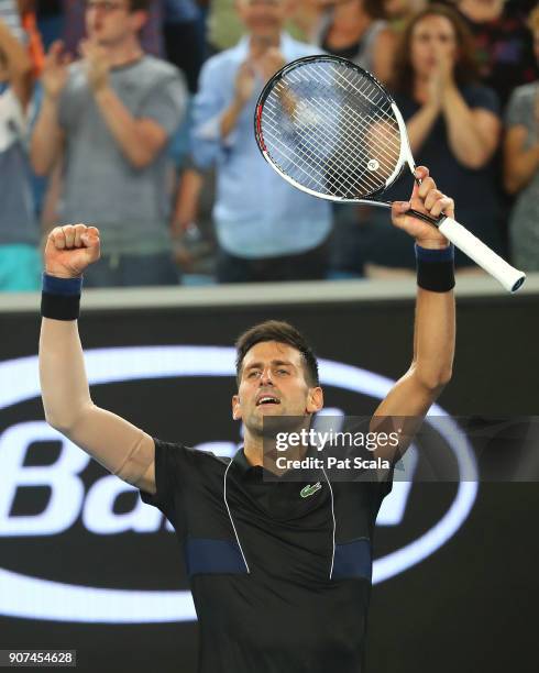 Novak Djokovic of Serbia celebrates on match point in his third round match against Albert Ramos-Vinolas of Spain on day six of the 2018 Australian...