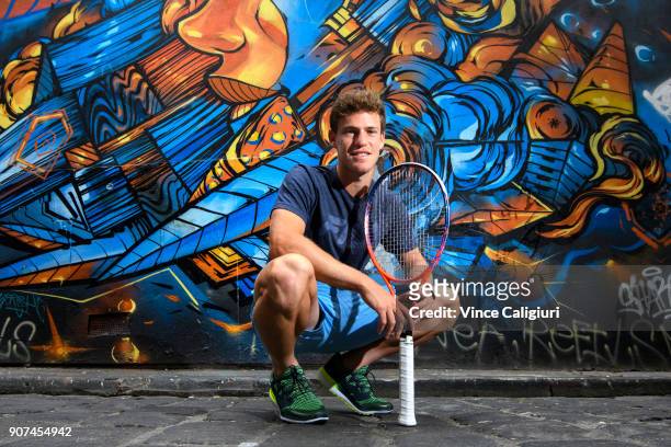 Diego Schwartzman of Argentina poses in Hosier Lane, Melbournes famous street art laneway during day six of the 2018 Australian Open at Melbourne...