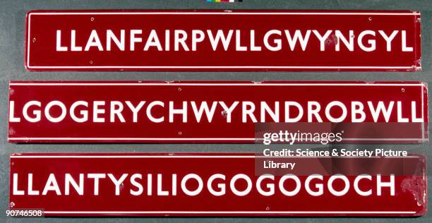 Llanfairpwllgwyngyllgogerychwyrndrobw- llllantysiliogogogoch station sign, North Wales, c 1990s. This Welsh place name forms the longest station sign...