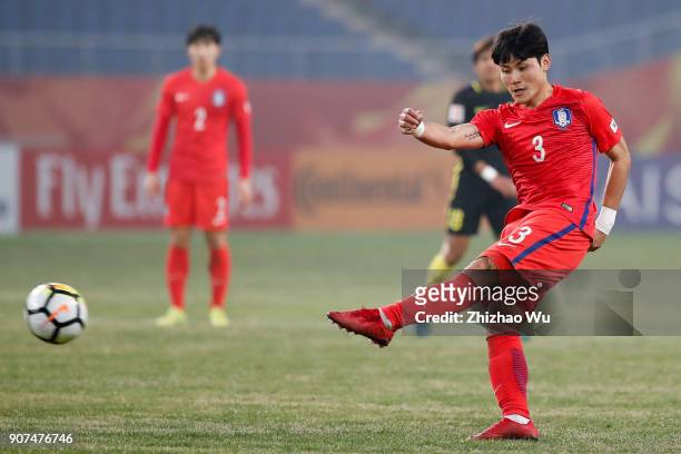 Lee Gun of South Korea shots during AFC U23 Championship Quarter-final between South Korea and Malaysia at Kunshan Sports Center on January 20, 2018...
