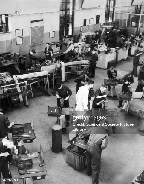 Young men working at the workshops of British Railways' Locomotive Training School at Derby. A scene from the British Transport Films production...