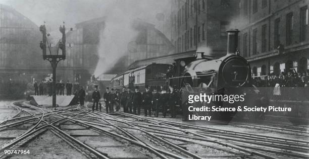 Train leaving Paddington Station in London. The broad gauge used on the Great Western Railway , designed by Isambard Kingdom Brunel in the 1830s,...