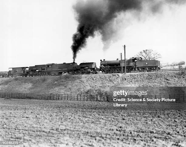 Wagon freight train hauled by Garratt locomotive No 47972, at Lickey Incline near Bromsgrove, Worcestershire, March 1950. The Incline, over two miles...