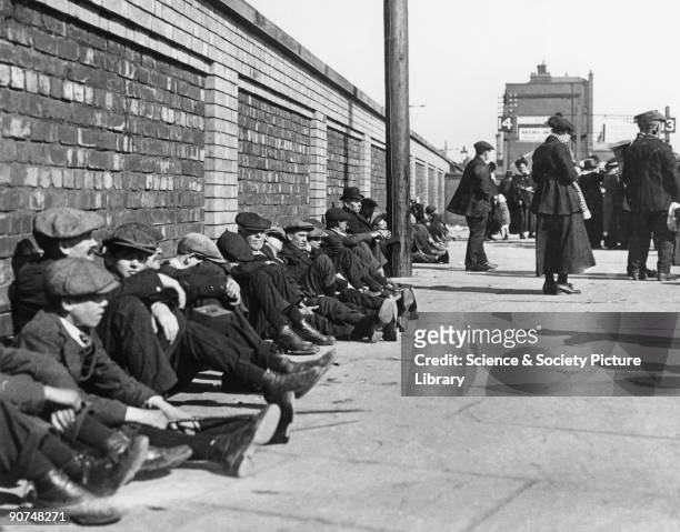 The miners wait on the platform during the afternoon of 21 June 1919, the day the report of the Royal Commission into the Coal Industry was presented...