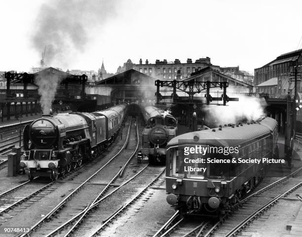 Hornet's Beauty' A2 Class steam locomotive at Leeds Central station, c 1954. This locomotive No 60535 is awaiting departure at the station with an...