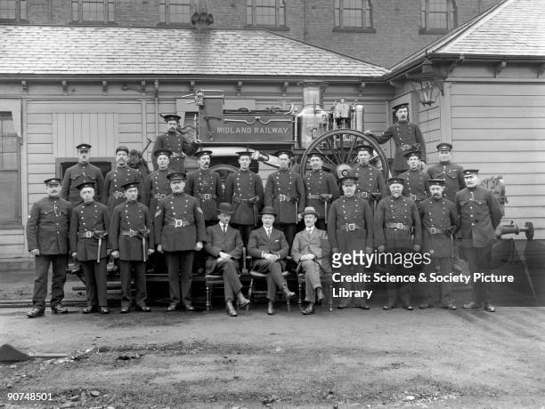 Midland Railway firemen, Derby works, Derbyshire, 1 February 1919. Firemen of the Midland Railway's Chief Mechanical Engineers' department pose with...