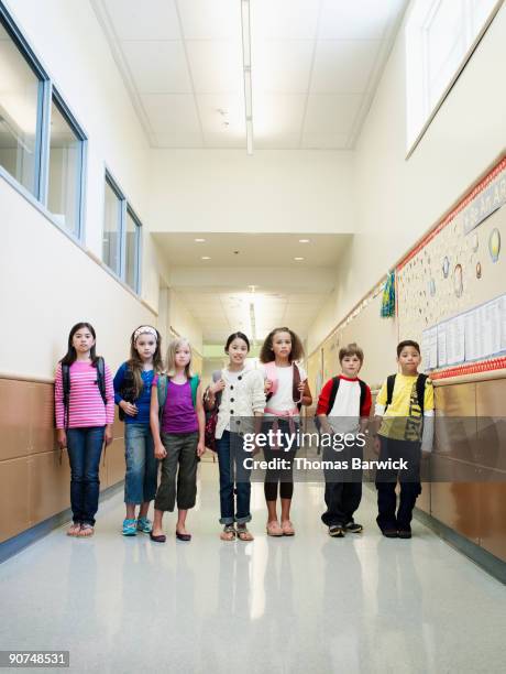 Group Of Young Students In Hallway Of School High-Res Stock Photo ...