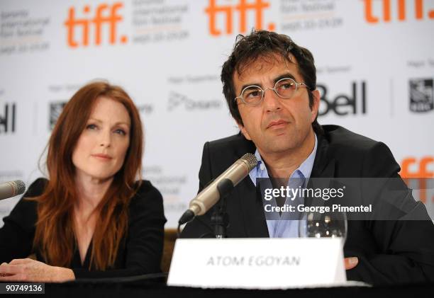 Actress Julianne Moore and director Atom Egoyan speak onstage at the "Chloe" press conference held at the Sutton Place Hotel on September 14, 2009 in...