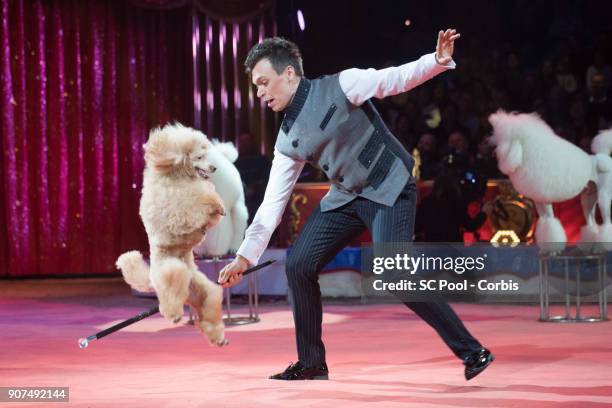 An artist with a dog perform during the 42nd International Circus Festival in Monte Carlo on January 19, 2018 in Monaco, Monaco.