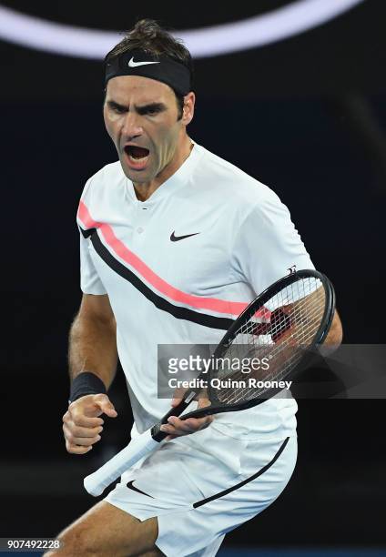 Roger Federer of Switzerland celebrates winning a point in his third round match against Richard Gasquet of France on day six of the 2018 Australian...