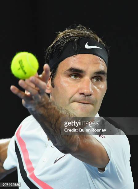 Roger Federer of Switzerland serves in his third round match against Richard Gasquet of France on day six of the 2018 Australian Open at Melbourne...