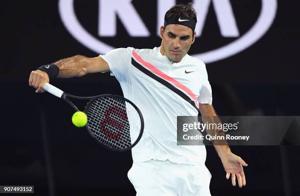 Roger Federer of Switzerland plays a backhand in his third round match against Richard Gasquet of France on day six of the 2018 Australian Open at...