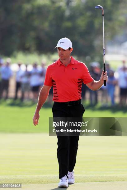 Rory McIlroy of Northern Ireland celebrates after chipping in for birdie on the 17th hole during round three of the Abu Dhabi HSBC Golf Championship...