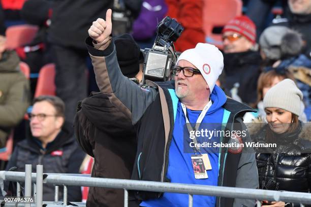 Singer Gerhard Friedle better known as 'DJ Oetzi gestures during the Hahnenkamm race on January 20, 2018 in Kitzbuehel, Austria.