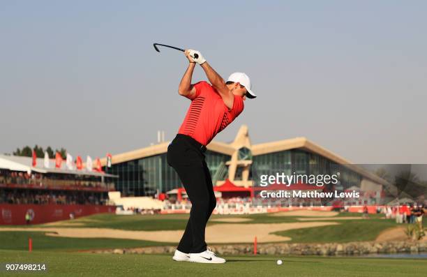 Rory McIlroy of Northern Ireland plays his second shot on the 18th hole during round three of the Abu Dhabi HSBC Golf Championship at Abu Dhabi Golf...
