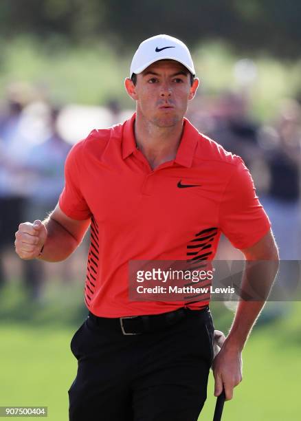 Rory McIlroy of Northern Ireland celebrates after chipping in for birdie on the 17th hole during round three of the Abu Dhabi HSBC Golf Championship...