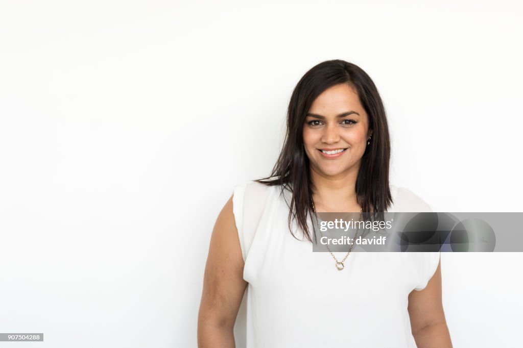 Portrait on a White Background of a Happy New Zealand Maori Woman