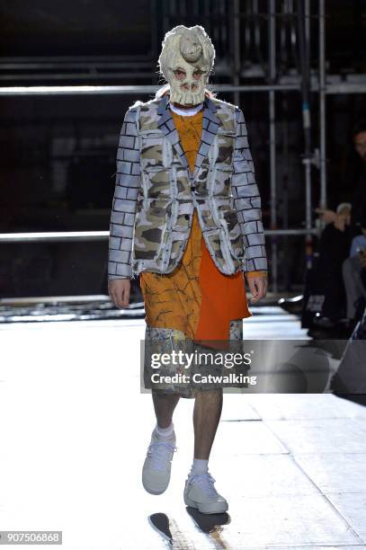 Model walks the runway at the Comme Des Garcons Homme Plus Autumn Winter 2018 fashion show during Paris Menswear Fashion Week on January 19, 2018 in...