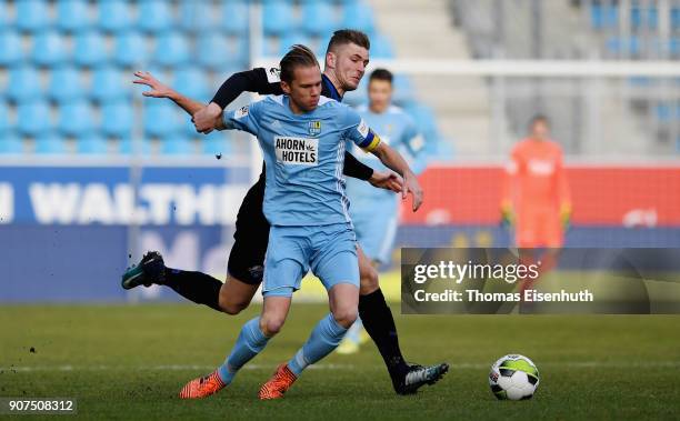 Dennis Grote of Chemnitz is challenged by Dennis Srbeny of Paderborn during the 3. Liga match between Chemnitzer FC and SC Paderborn 07 at...