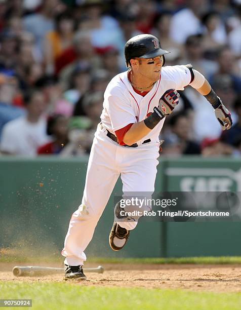 Dustin Pedroia of the Boston Red Sox bats against the Oakland Athletics at Fenway Park on July 30, 2009 in Boston, Massachusetts The Red Sox defeated...