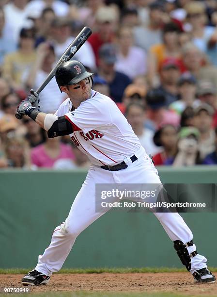 Dustin Pedroia of the Boston Red Sox bats against the Oakland Athletics at Fenway Park on July 30, 2009 in Boston, Massachusetts The Red Sox defeated...