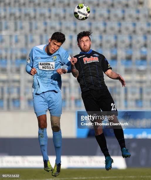 Myroslav Slavov of Chemnitz is challenged by Robin Krausse of Paderborn during the 3. Liga match between Chemnitzer FC and SC Paderborn 07 at...