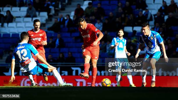 Luis Muriel of Sevilla FC scores his team's third goal during the La Liga match between Espanyol and Sevilla at Nuevo Estadio de Cornella-El Prat on...