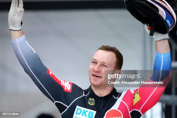 Francesco Friedrich of Germany celebrates victory after winning with his team mate Thorsten Margis at Deutsche Post Eisarena Koenigssee the BMW IBSF...