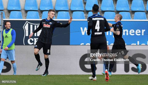 Dennis Srbeny of Paderborn celebrates with Sven Michel after scoring his team's second goal during the 3. Liga match between Chemnitzer FC and SC...