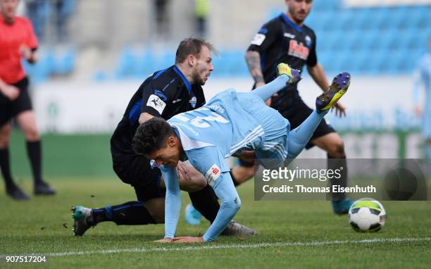 Myroslav Slavov of Chemnitz is fouled by Felix Herzenbruch of Paderborn during the 3. Liga match between Chemnitzer FC and SC Paderborn 07 at...