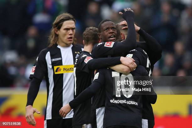 Matthias Ginter of Moenchengladbach is celebrates by his team mates after he scored a goal to make it 1:0 during the Bundesliga match between...