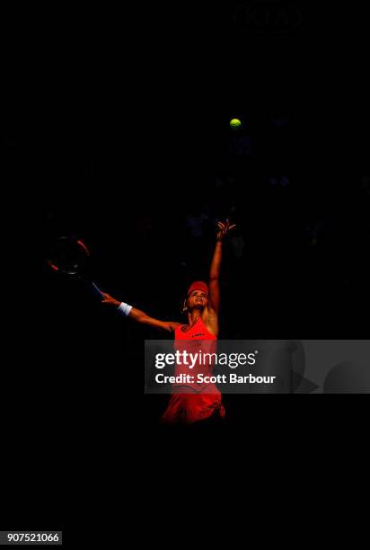 Lauren Davis of the United States serves in her third round match against Simona Halep of Romania on day six of the 2018 Australian Open at Melbourne...