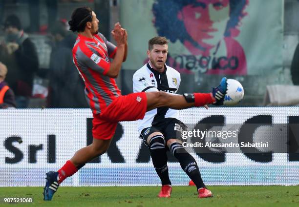 Simone Iacoponi of Parma Calcio competes for the ball with Mariano Arini of US Cremonese during the serie B match between US Cremonese and Parma FC...