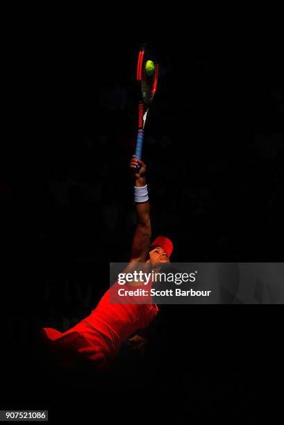 Lauren Davis of the United States serves in her third round match against Simona Halep of Romania on day six of the 2018 Australian Open at Melbourne...